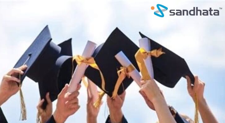 people waving their graduation caps in the air